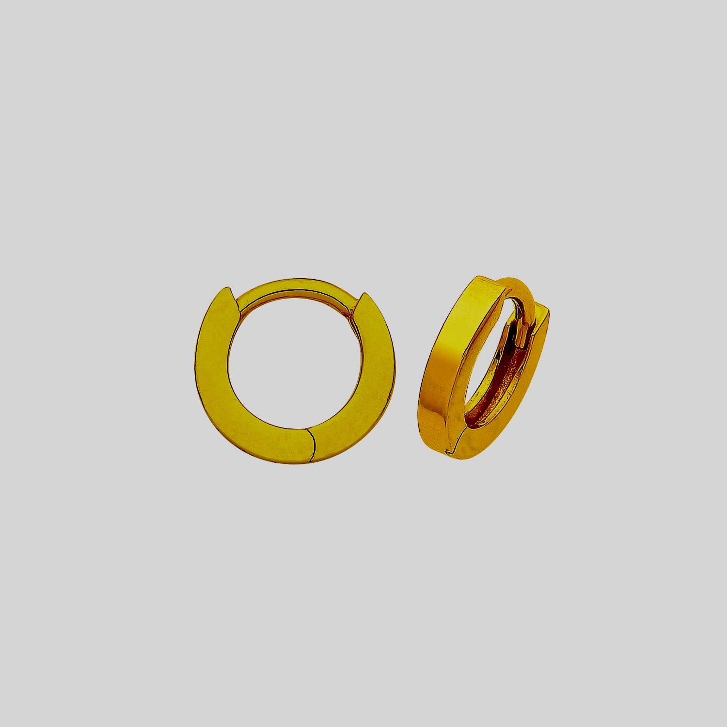a pair of yellow rings on a white background